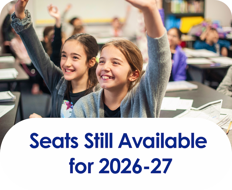 kids-in-class-raising-hands